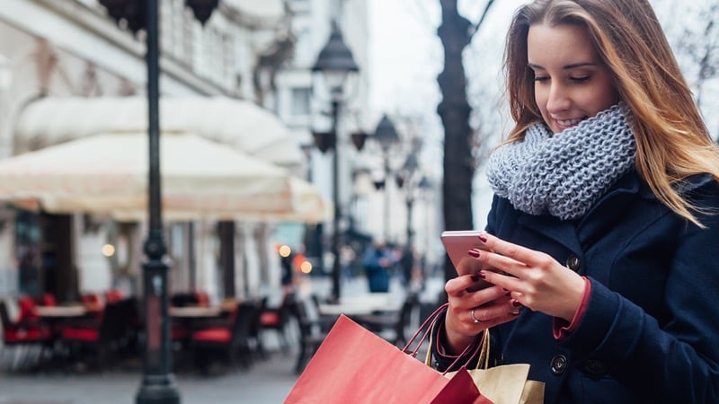 woman looking at her phone